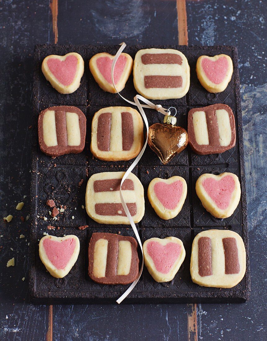 Black and white biscuits, and vanilla and raspberry hearts