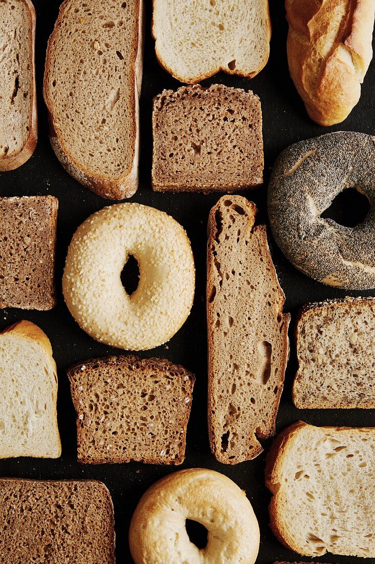 Different types of sliced bread and bagels