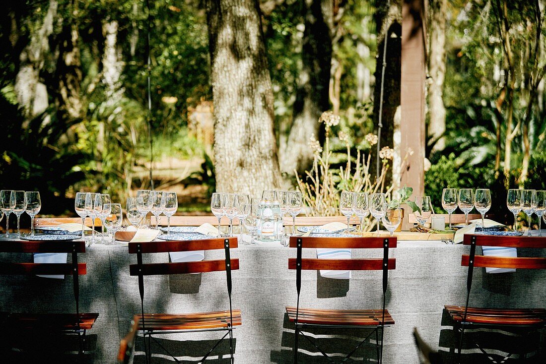 A table laid under trees