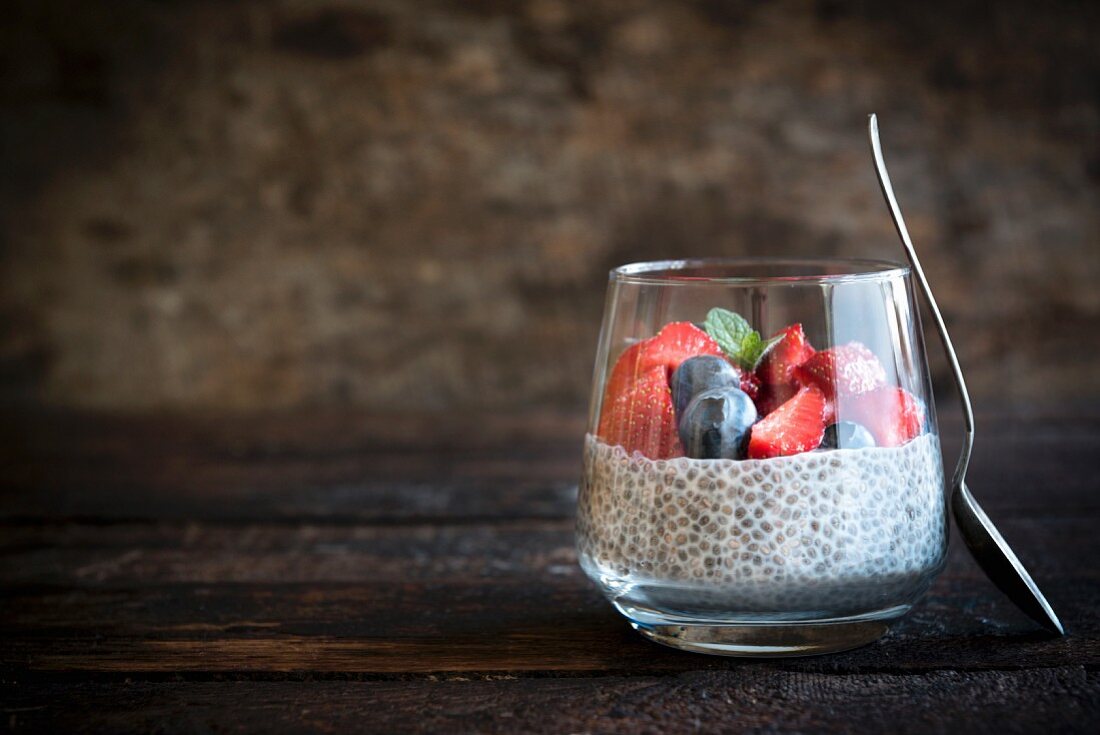 Chia pudding with berries in a glass