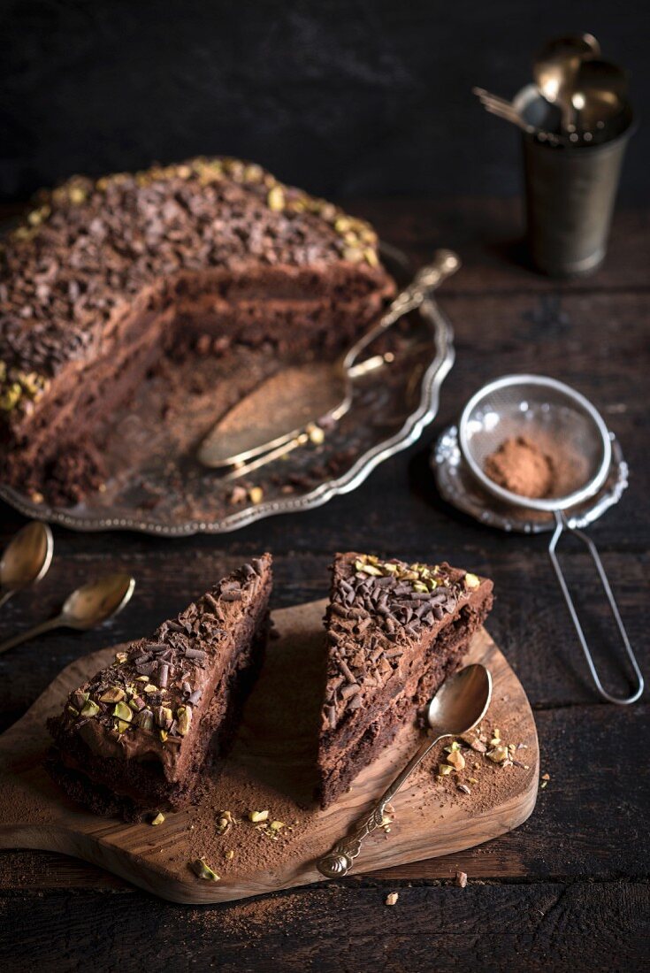 Homemade chocolate cake served on wooden board