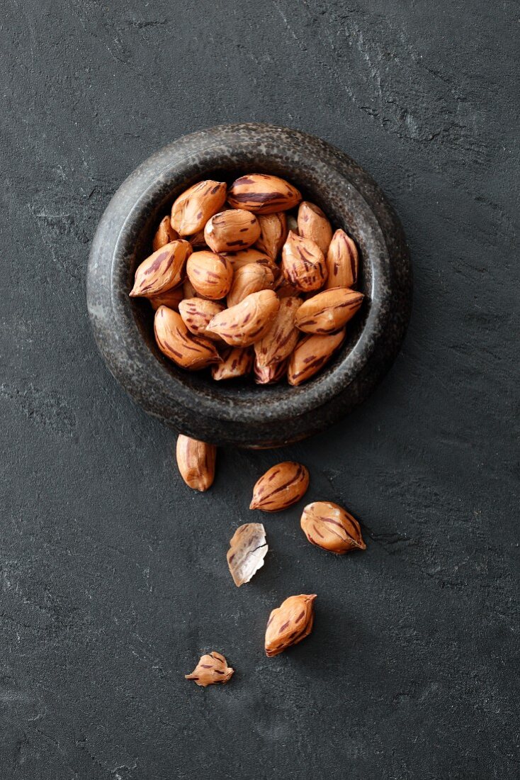 Wild peanuts in a stone bowl