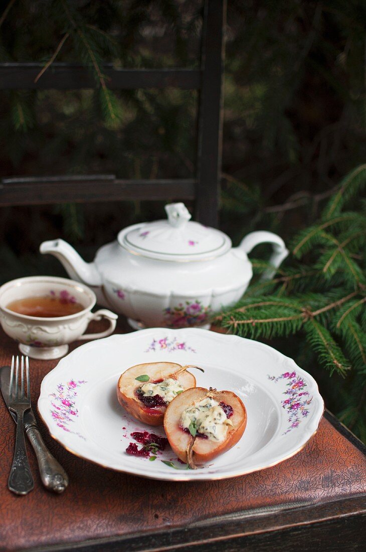 A pan-fried pear filled with cranberry jam and blue cheese