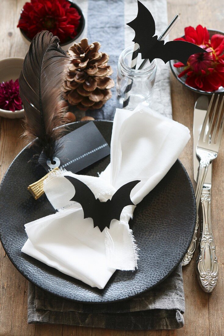 Halloween table decorated with hand-made paper bats