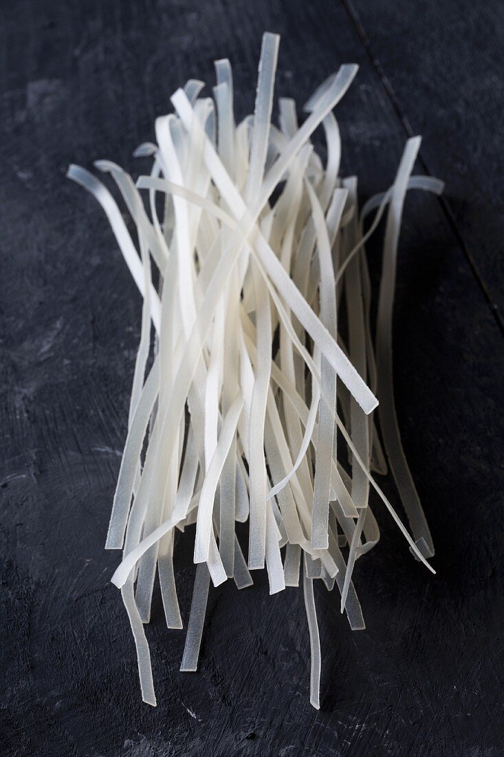 Dried glass noodles on a black background