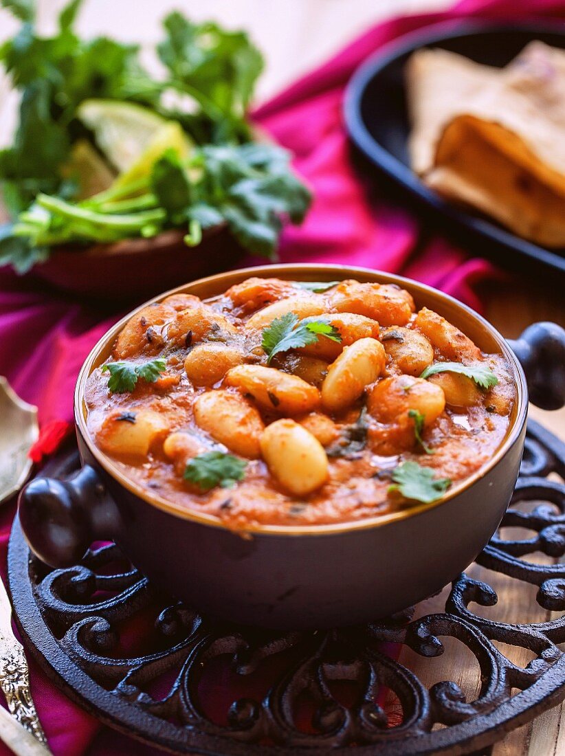 Lima bean and tomato curry with coriander