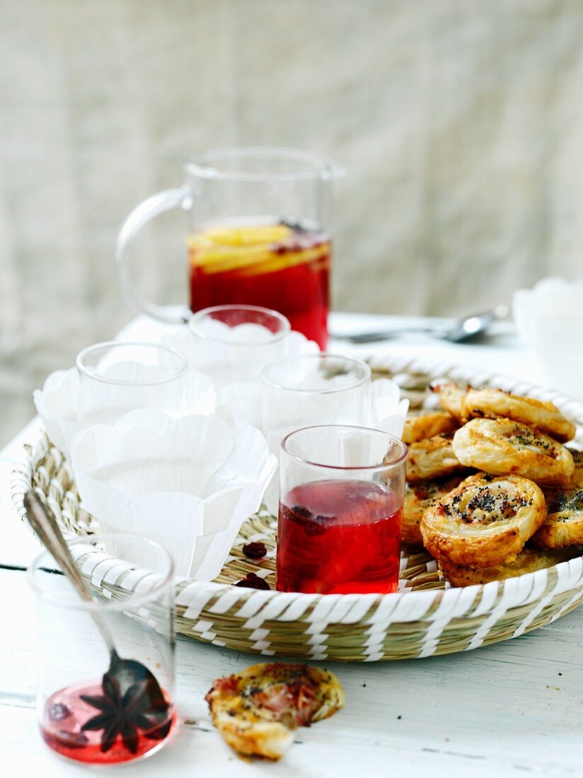 Cranberry spritzers and spicy pastries