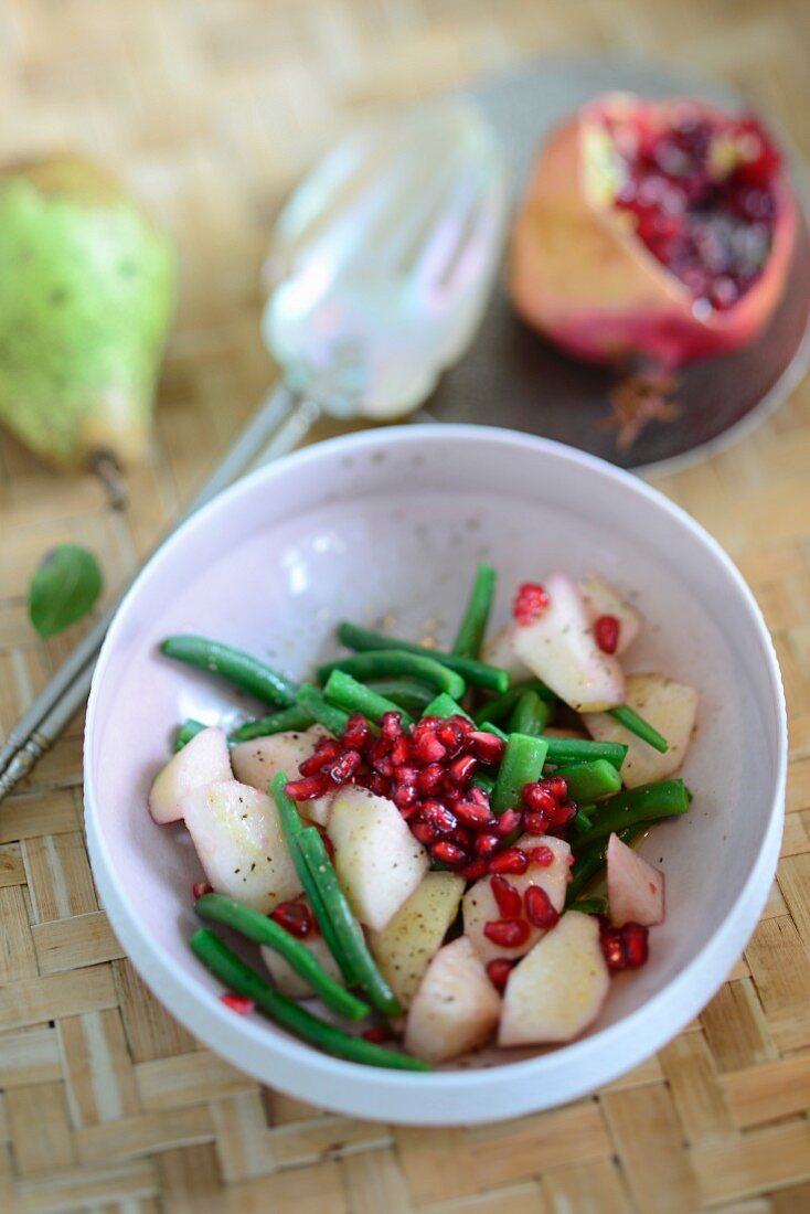 Bean salad with pears and pomegranate seeds