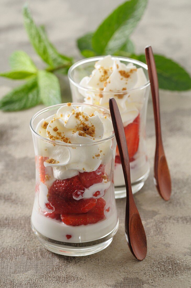 Fontainebleau (cream cheese dessert, France) with strawberries and cream