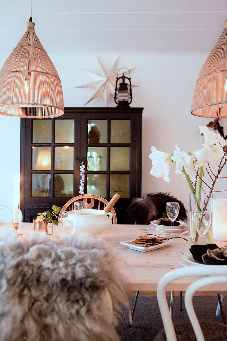 Dining table set for Christmas in rustic style in natural shades