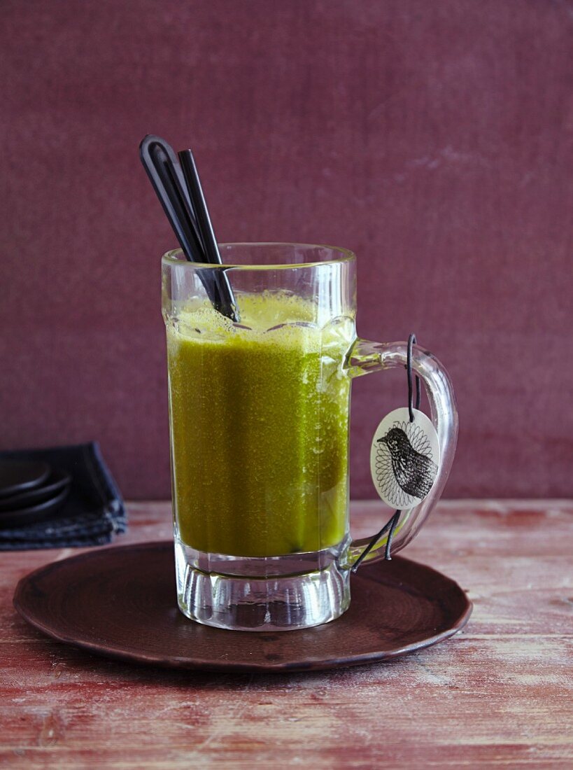 A pumpkin and lettuce smoothie with orange - 'Halloween Monster'
