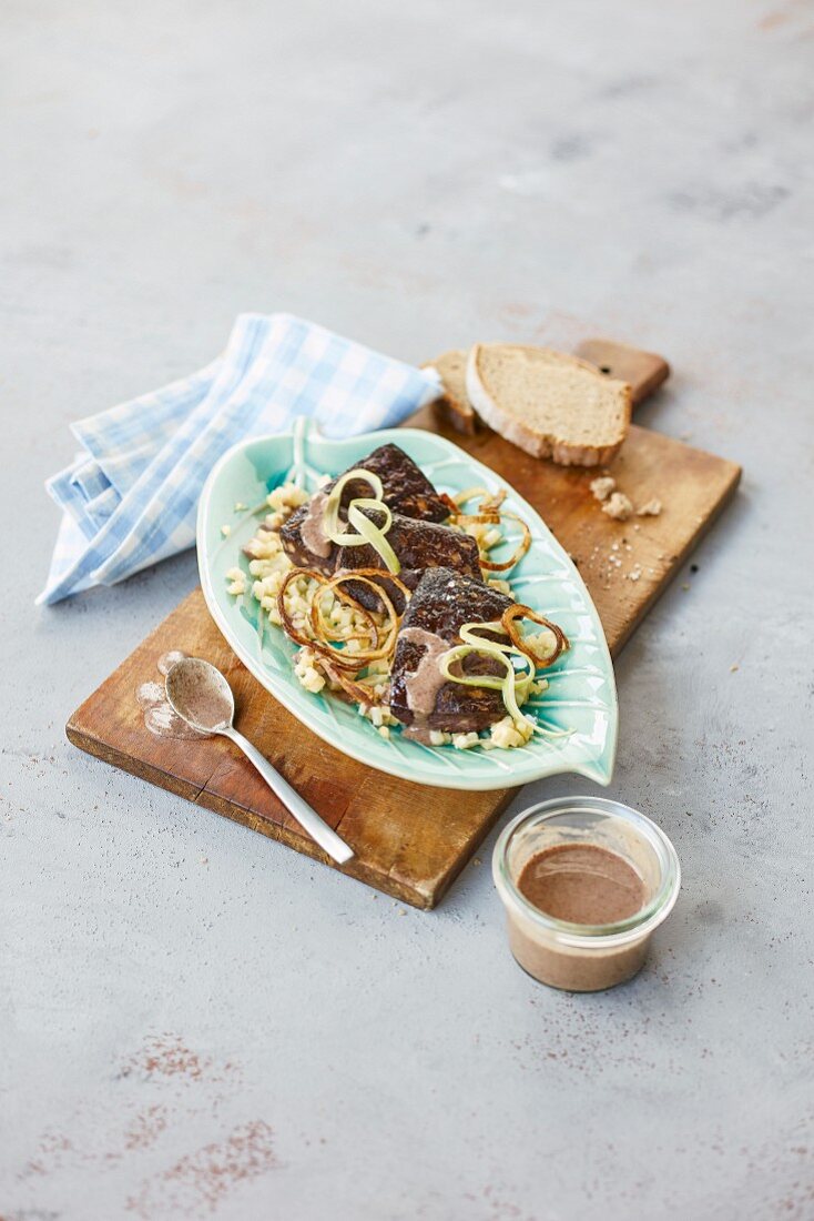 Fried blood sausage with apple and celeriac compote