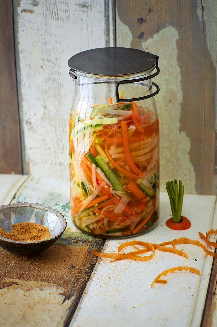 Quick Asian pickle with carrot, radish, and cucumber strips