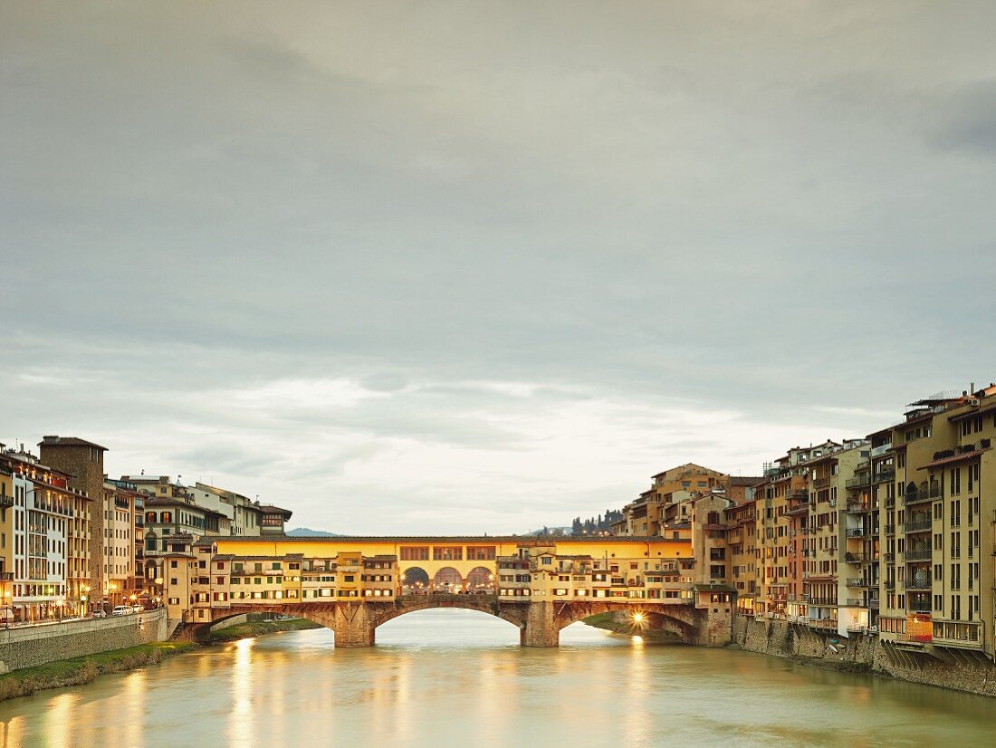 The Ponte Vecchio bridge over the Arno River in Florence, Tuscany, Italy