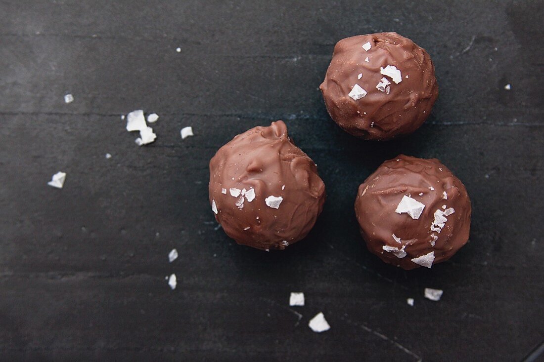 Three chocolate truffle pralines