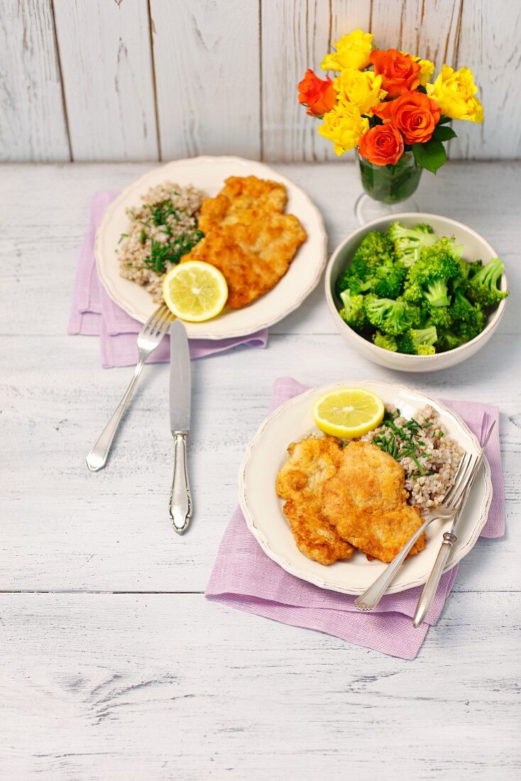 Fried turkey slices with barley and broccoli