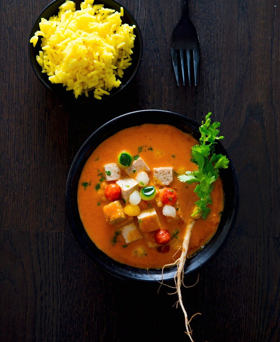 Tofu and vegetable curry with turmeric rice