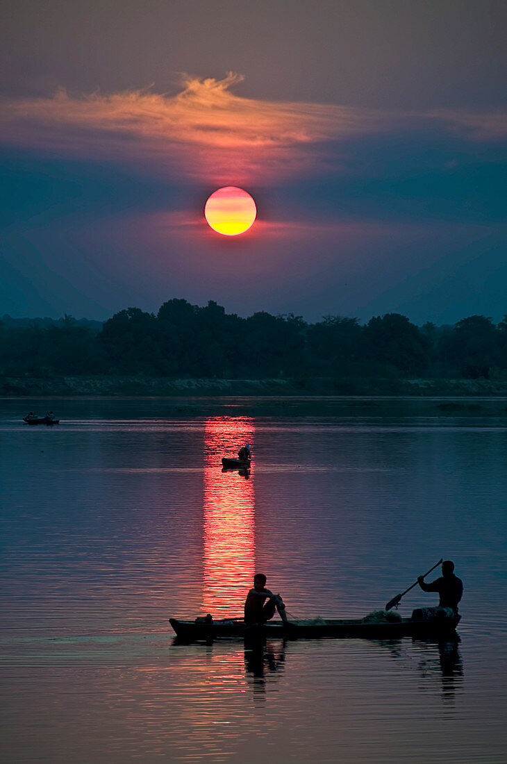 Fishing boats at sunset, Brazil