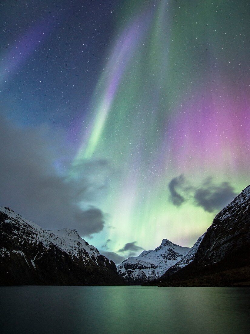 Aurora borealis over a fjord