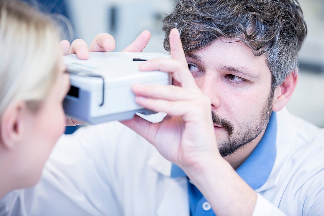 Female patient having eye examination