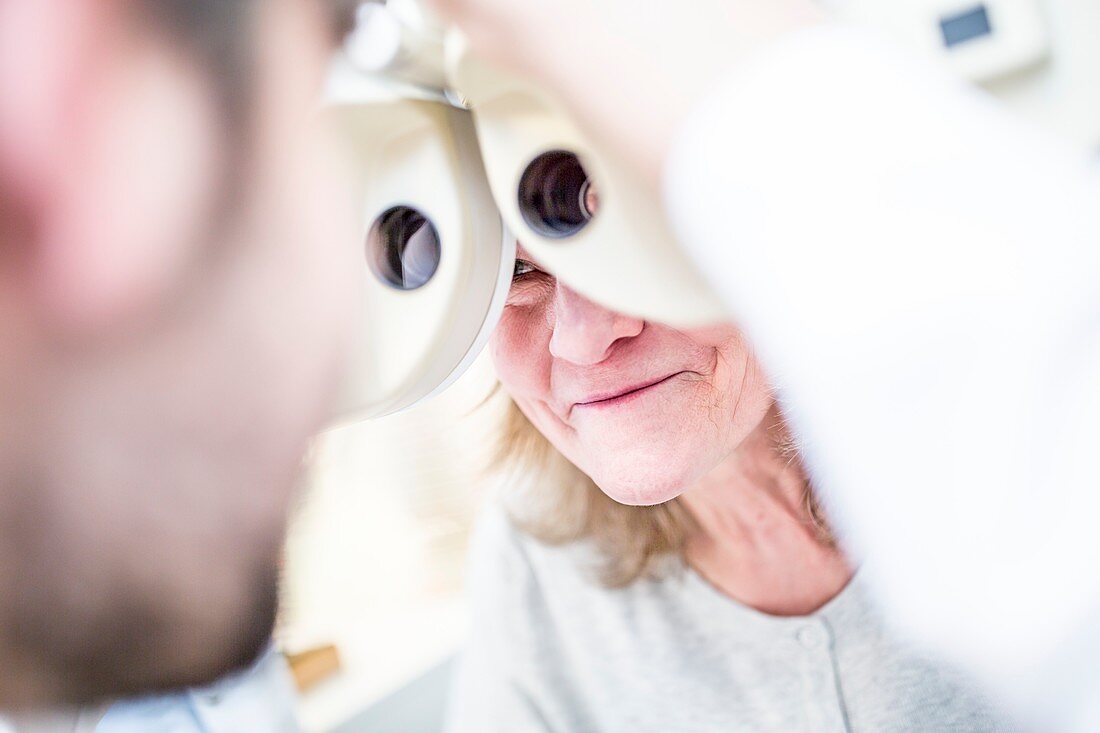 Woman having eye examination