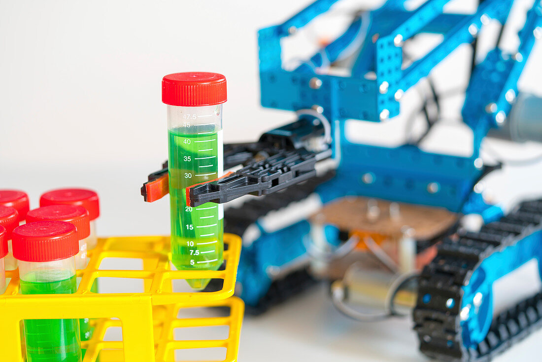 Robotic arm holding test tube