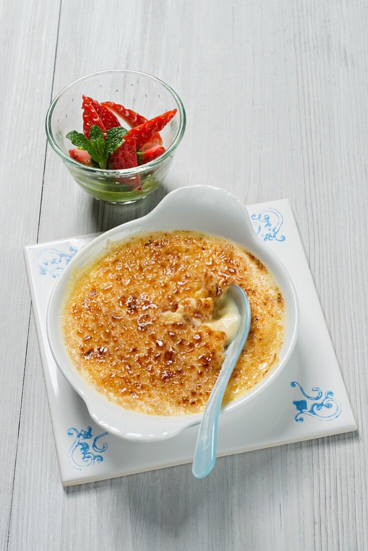 Crema catalana with almonds and strawberries (Spain)