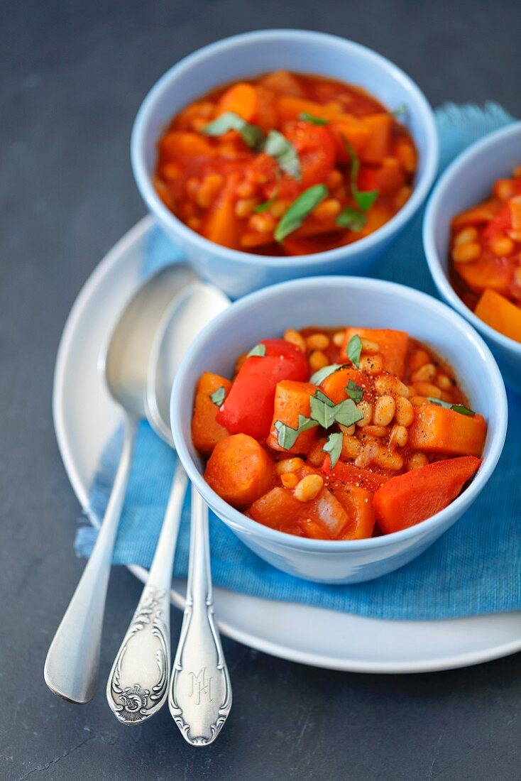 Vegetarian goulash with pumpkin, carrot, red pepper, beans and tomatoes