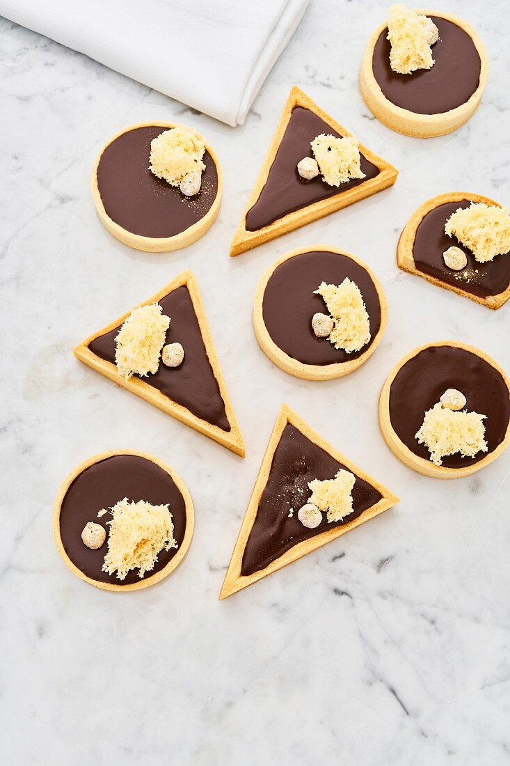 Circle and triangle shaped chocolate tarts