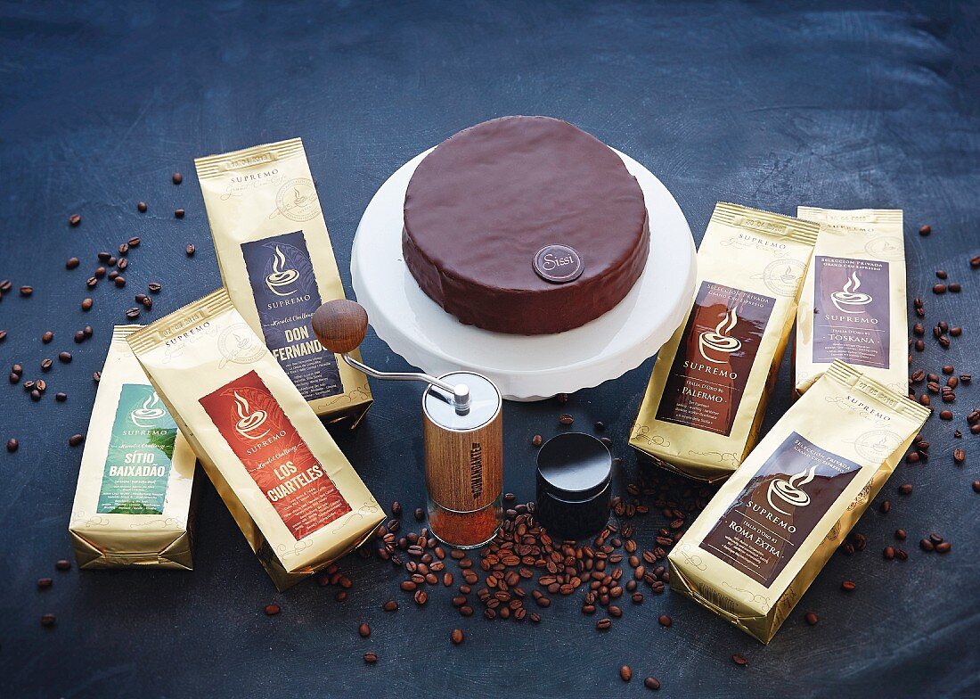 Supremo coffee, a hand grinder and Sissi cake with apricots, organic cocoa and Tahiti vanilla
