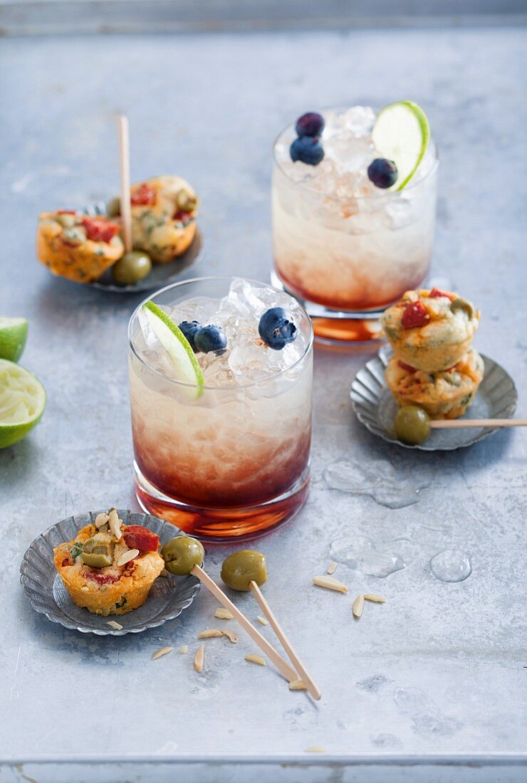 A Cassis Cooler served with mini muffins with chorizo