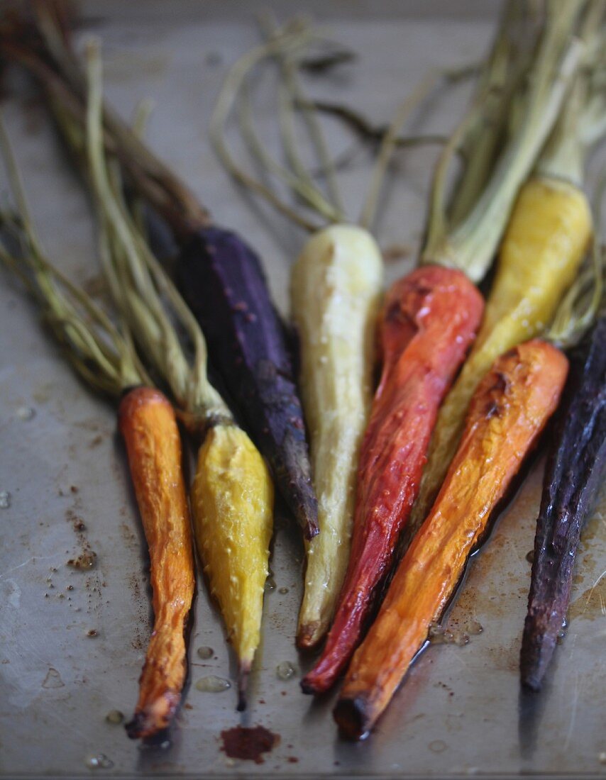 Different coloured pan-roasted carrots