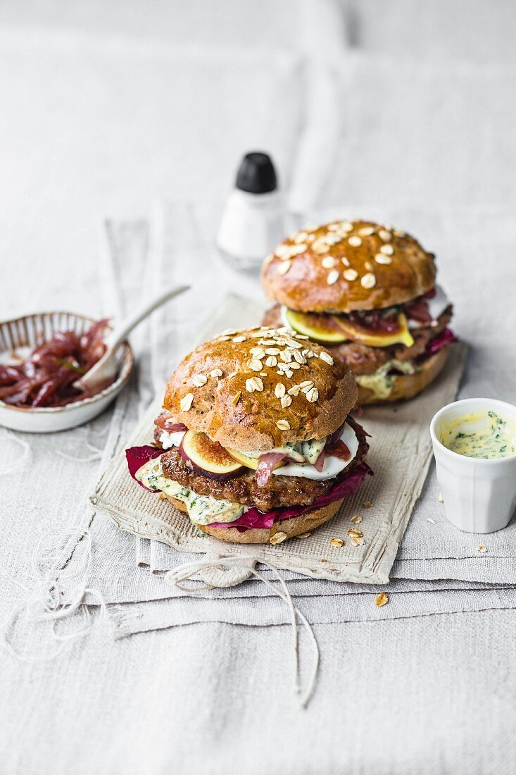 Burgers with pork, goat's cheese, fig, radicchio, and shallot confit