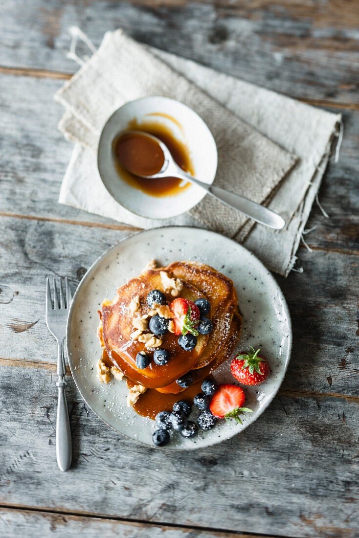 Pancakes with salted caramel and berries