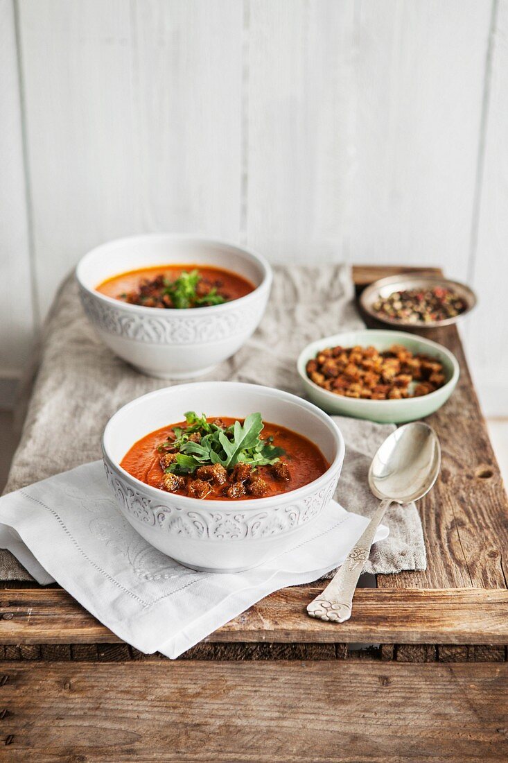 Tomato soup with rocket and herb croutons