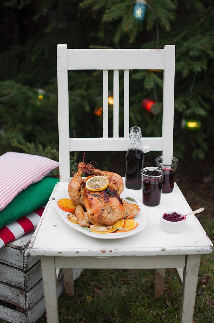 Christmas chicken roast made with oranges and sage, served with cranberry jam