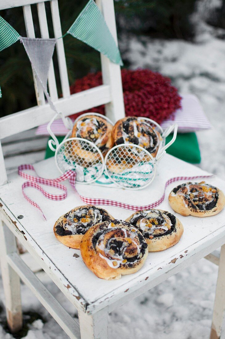 Christmas poppy seed buns, topped with icing