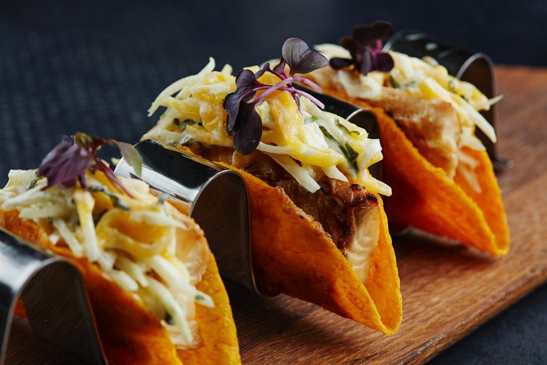Taco shells with fish and vegetables