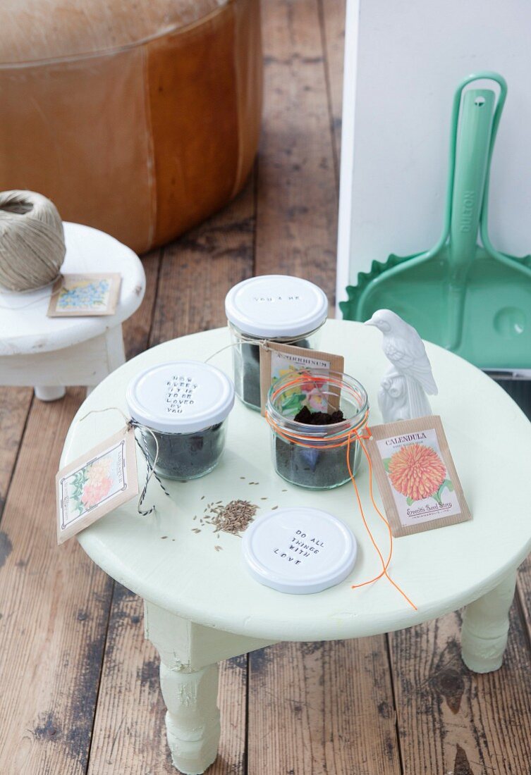 Flower seeds in screw-top jars with tags as gifts