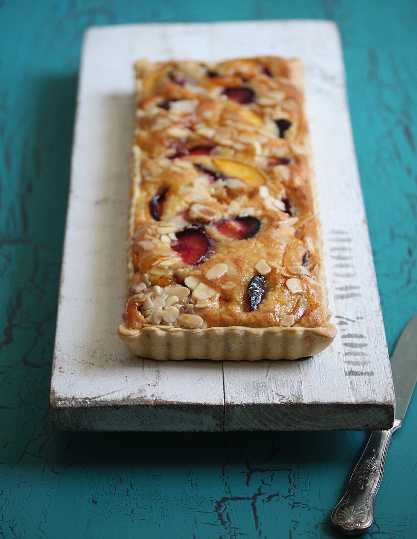Plum cake with flaked almonds