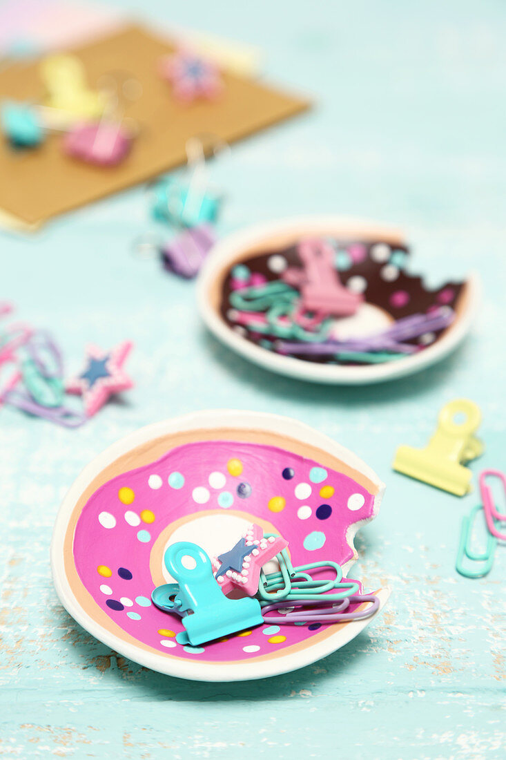 Doughnut-shaped dishes with bites missing