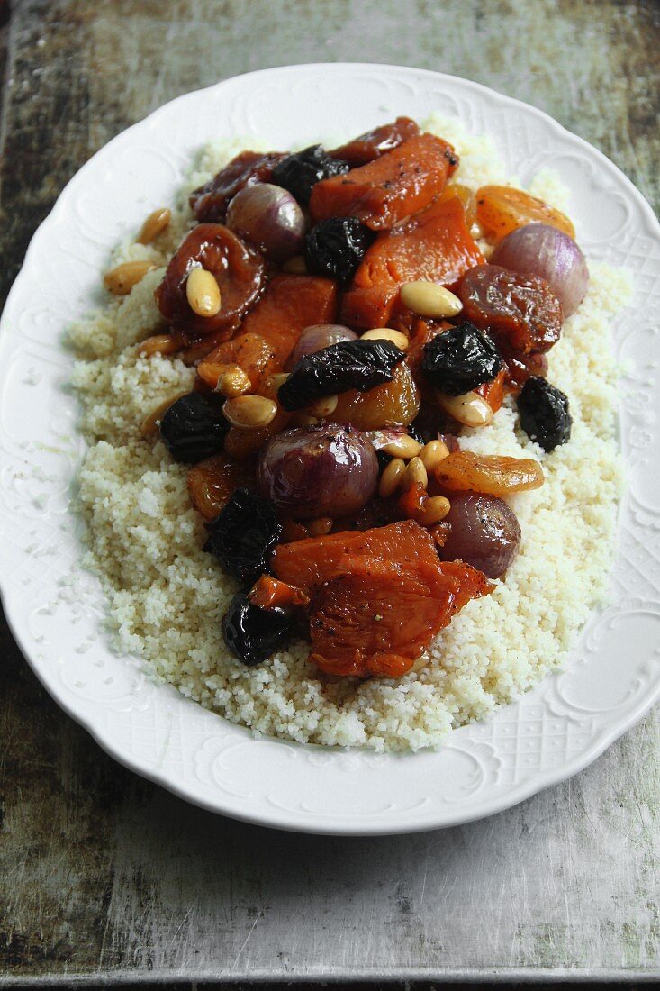 Couscous with dried fruits, onions and pine nuts