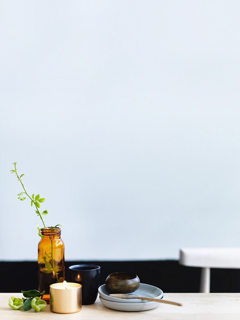 Easter table setting with candles and vase