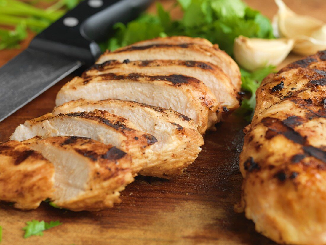 Grilled chicken breasts, sliced