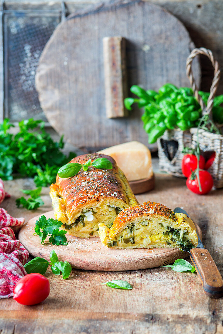Bread filled with cheese and green herbs