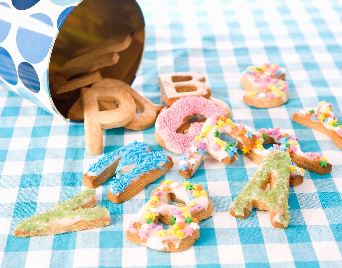 Brightly decorated letter biscuits