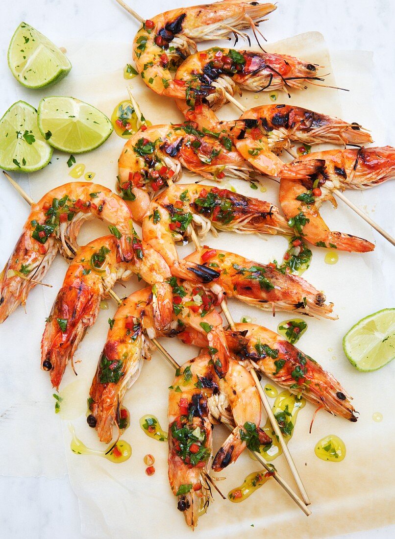 Prawn skewers with herbs and limes