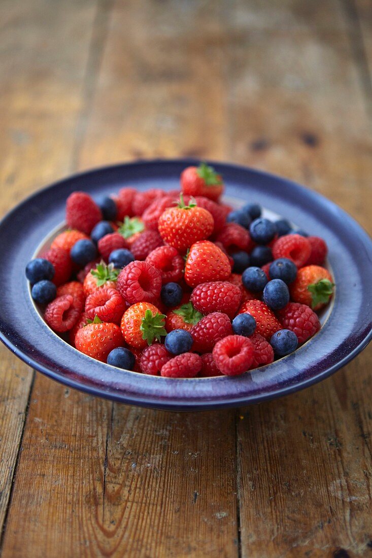 Bowl of fresh berries, blueberries, strawberries, raspberries