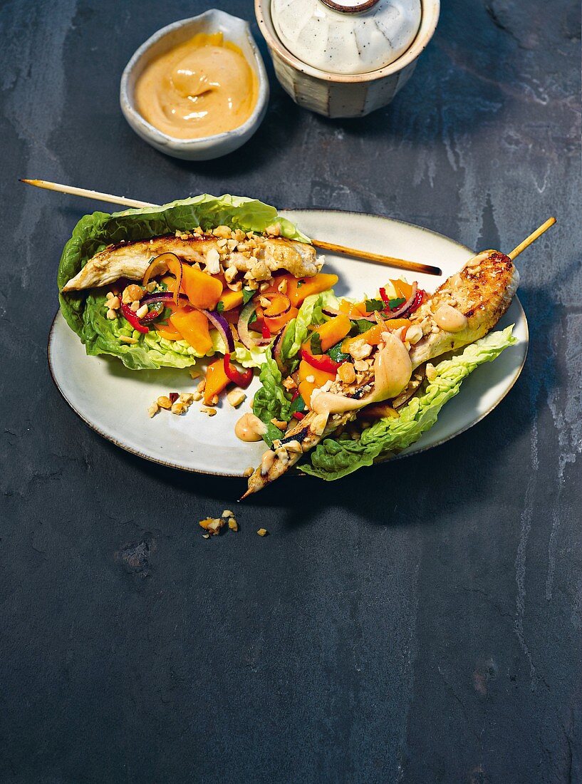 Chicken satay with mango salad