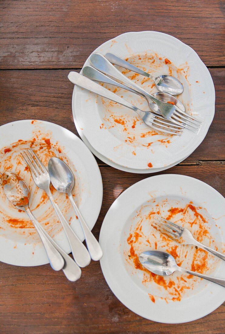Empty plates of pasta